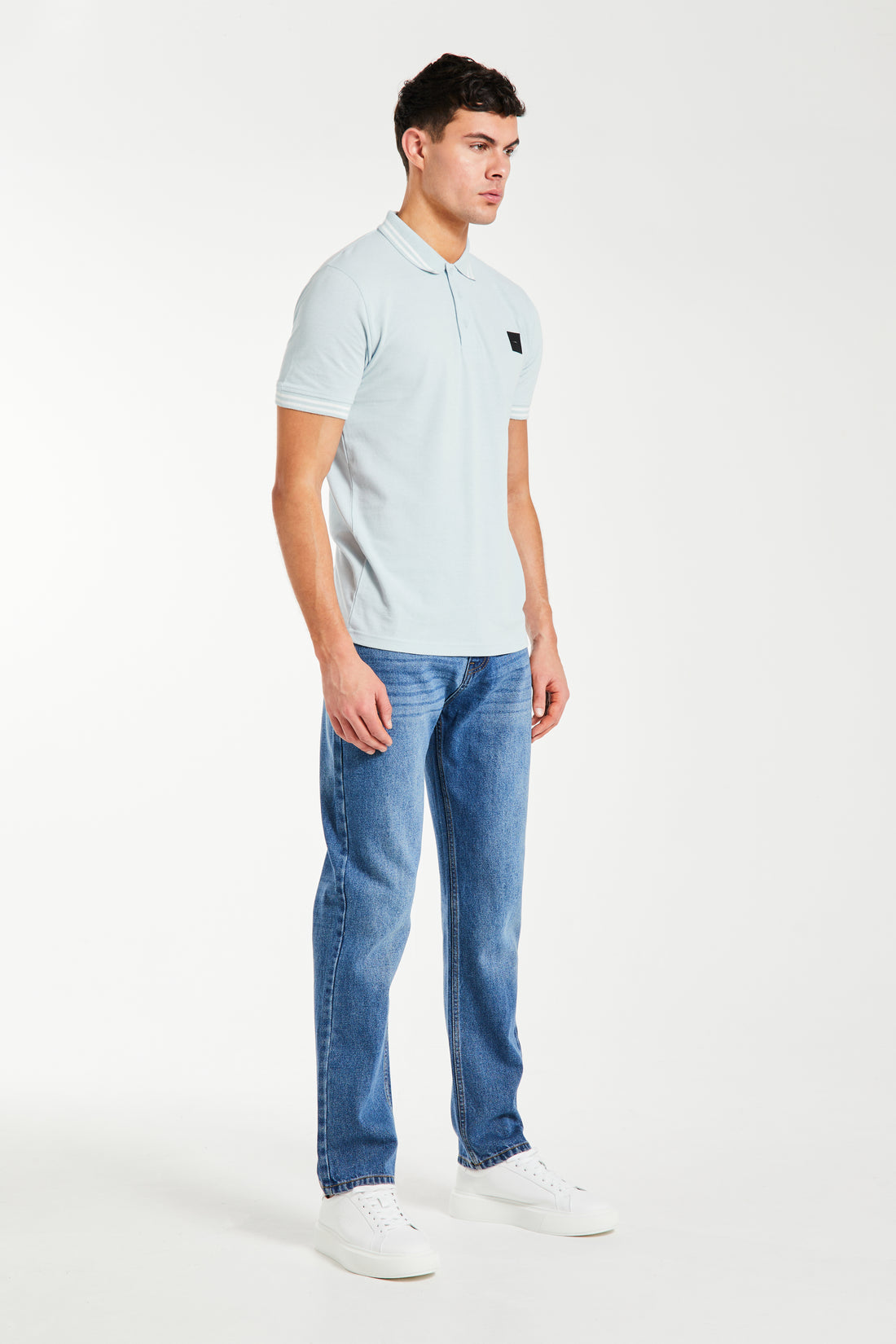 men's polo shirt sale in blue styled with jeans