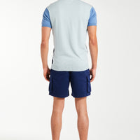 Back profile of blue men's knitted polo and shorts