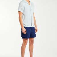 model wearing men's summer shirt in sky blue