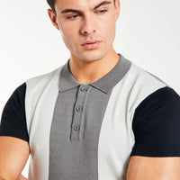 close up of button up block men's knitted polo in dark grey
