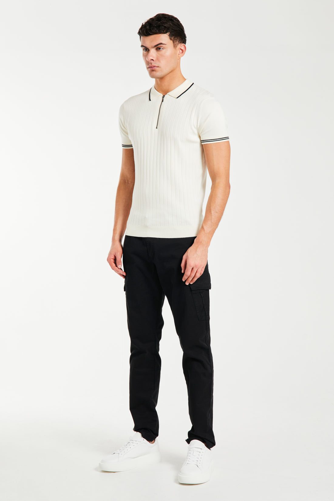 model styled wearing off white ribbed polo tshirt for men with zip up collar