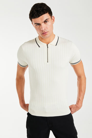Model wearing Cayton t-shirt in cream with black trim