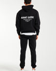 Back of mens full tracksuit with large logo