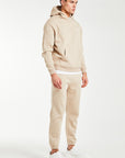 Side profile of mens taupe full tracksuit
