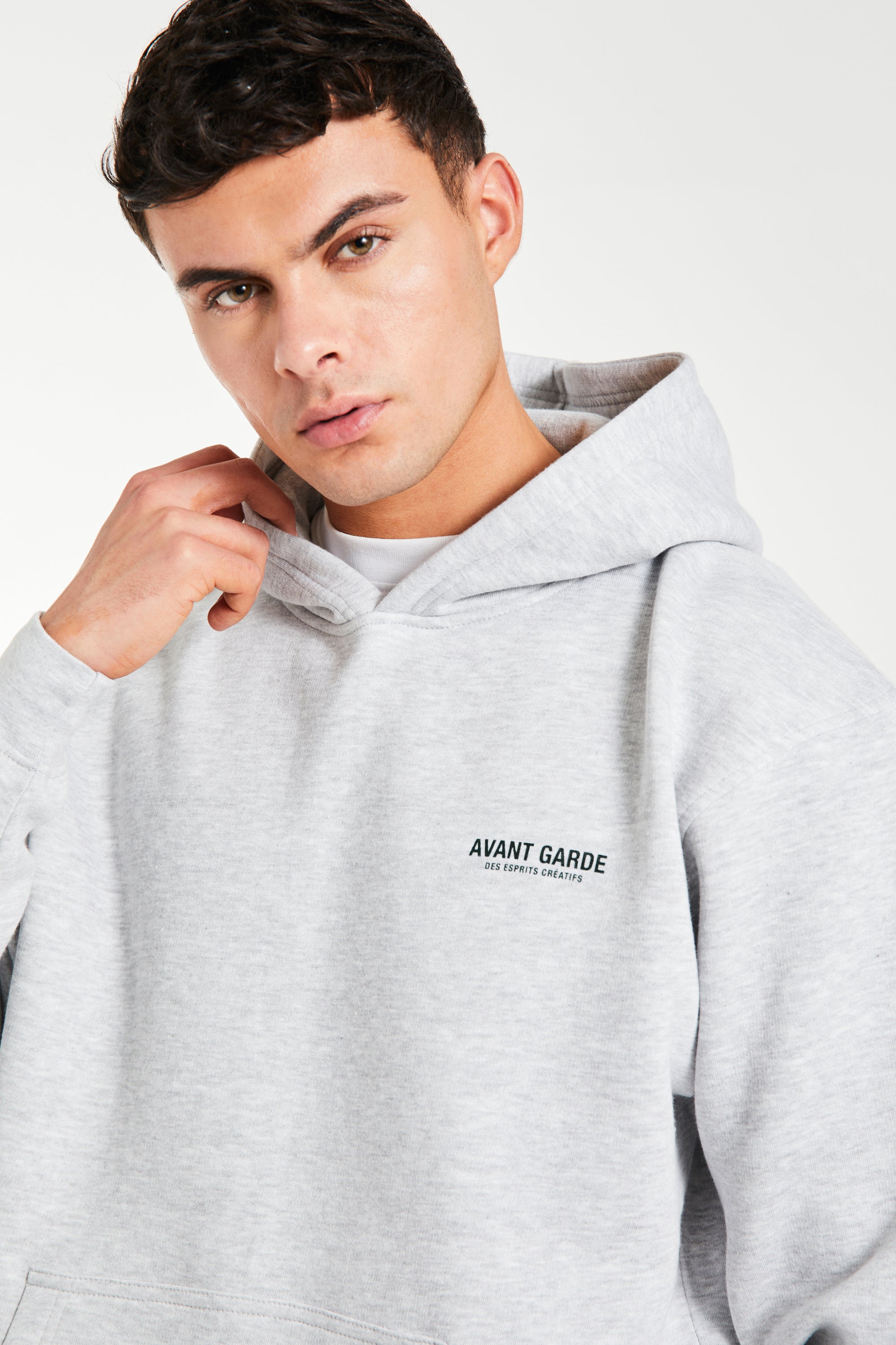 Logo detail on grey hoodie