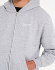 Avant Garde zip up hoodie with close up shot of Avant Garde logo