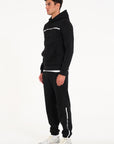 Model wearing men's full tracksuit