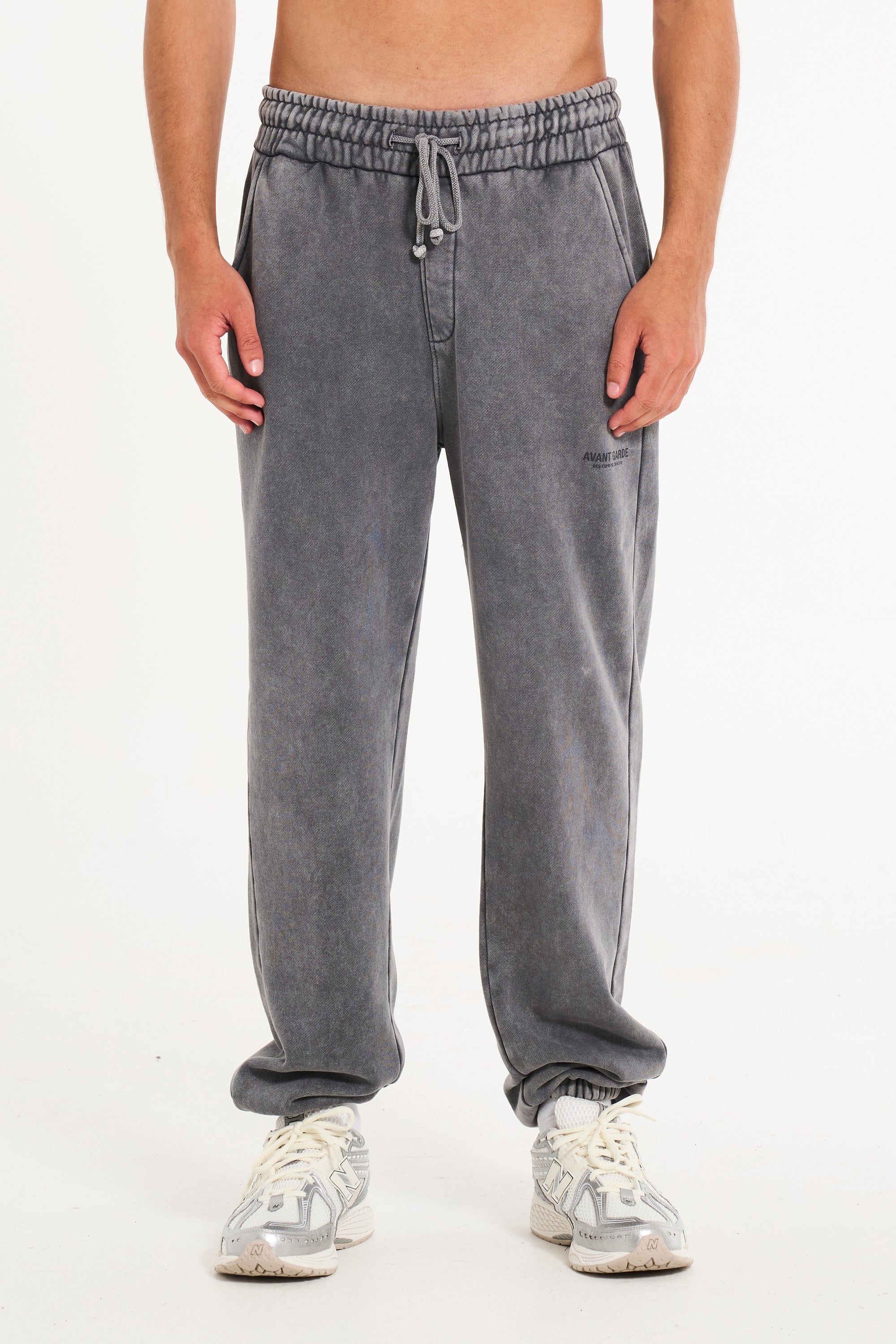 Model wearing steel tracksuit bottoms