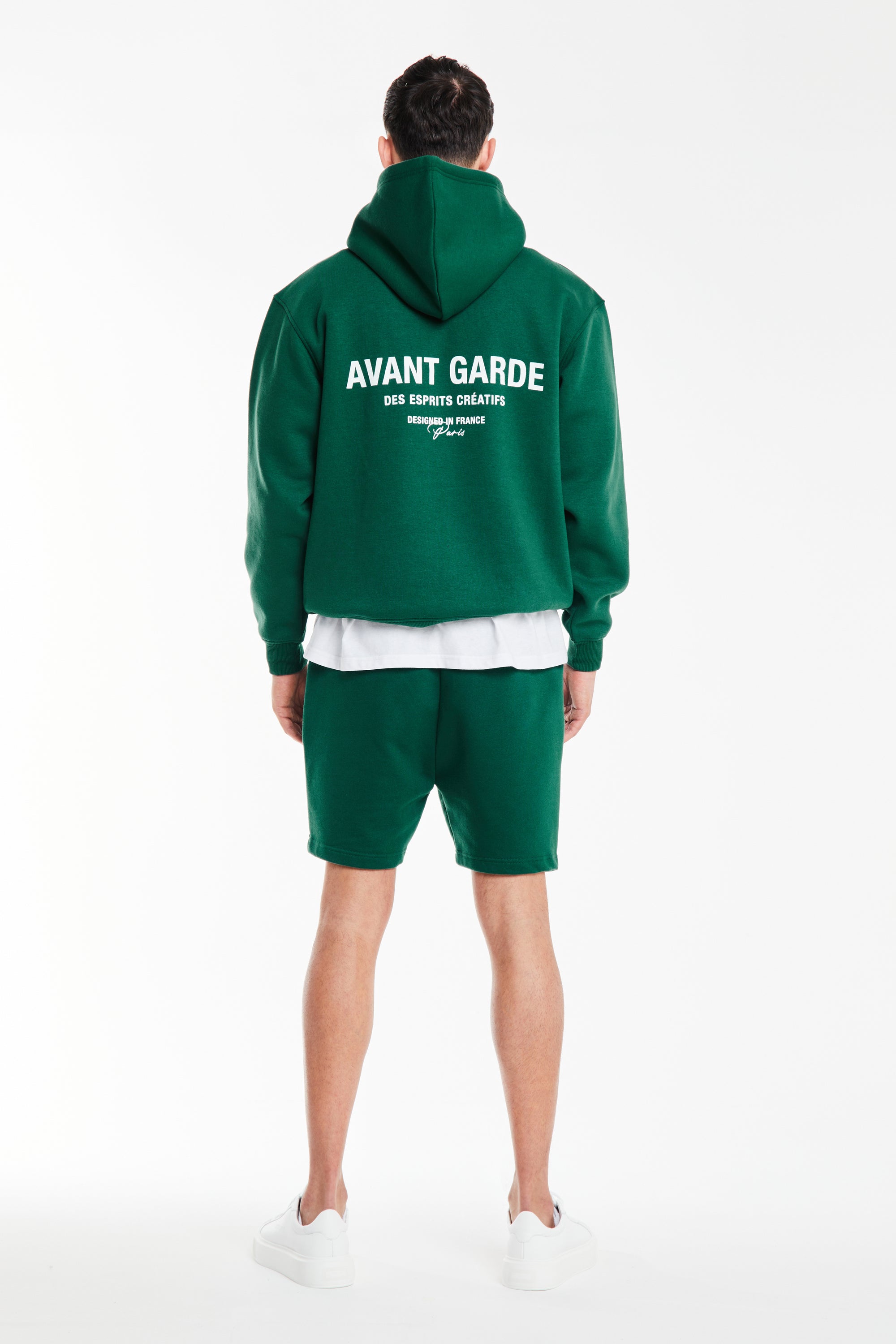 back profile of men's hoodies with 'avant garde' logo in dark green