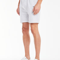 model wearing men's jersey shorts in light grey marl