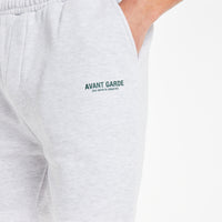 close up of 'avant garde paris' logo on jersey shorts in grey