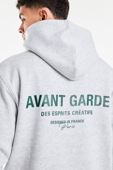 close up of 'Avant Garde' logo on back of men's hoodies in grey marl 