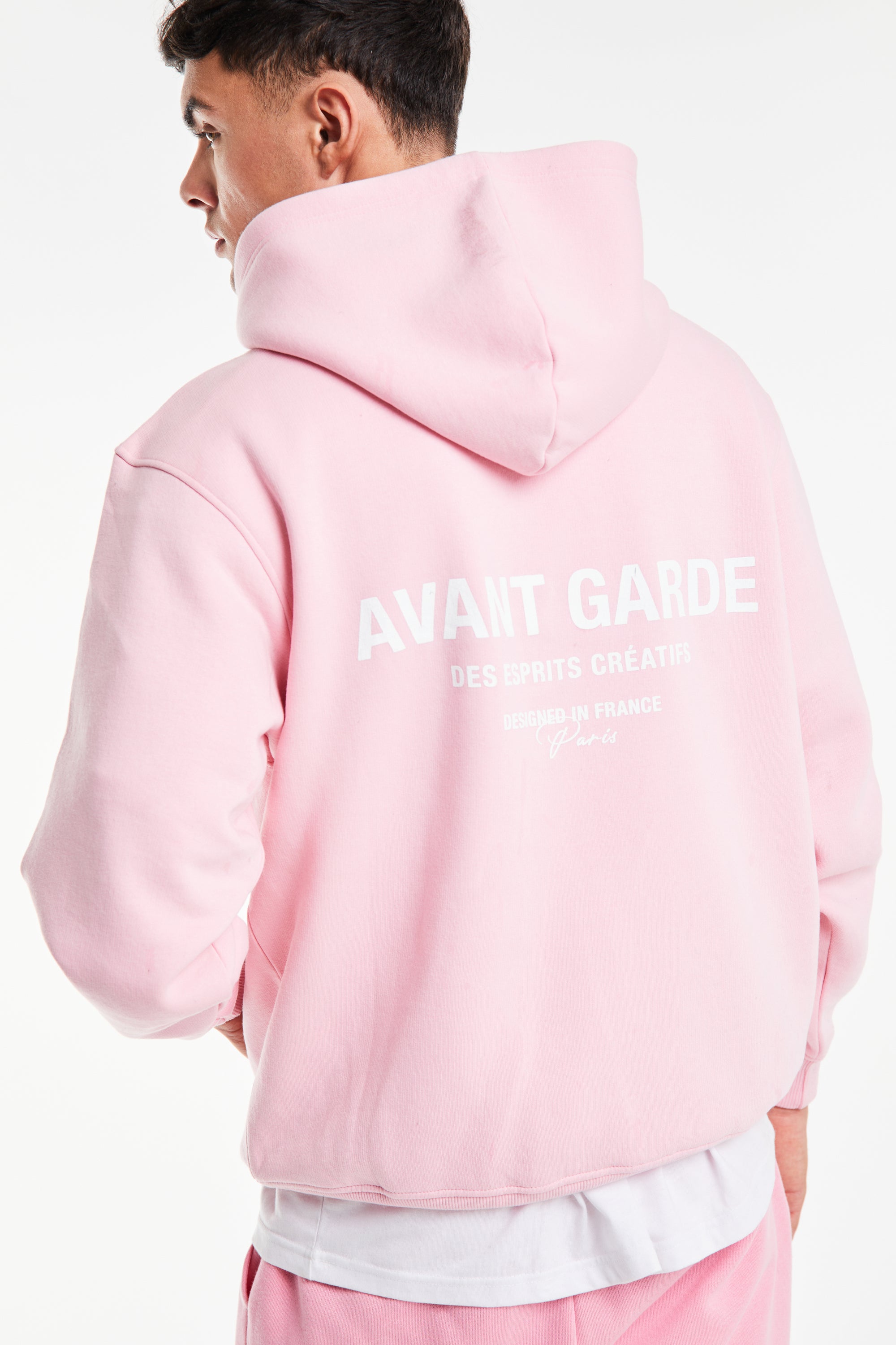 back profile of baby pink mens hoodies with 'Avant Garde Paris' logo