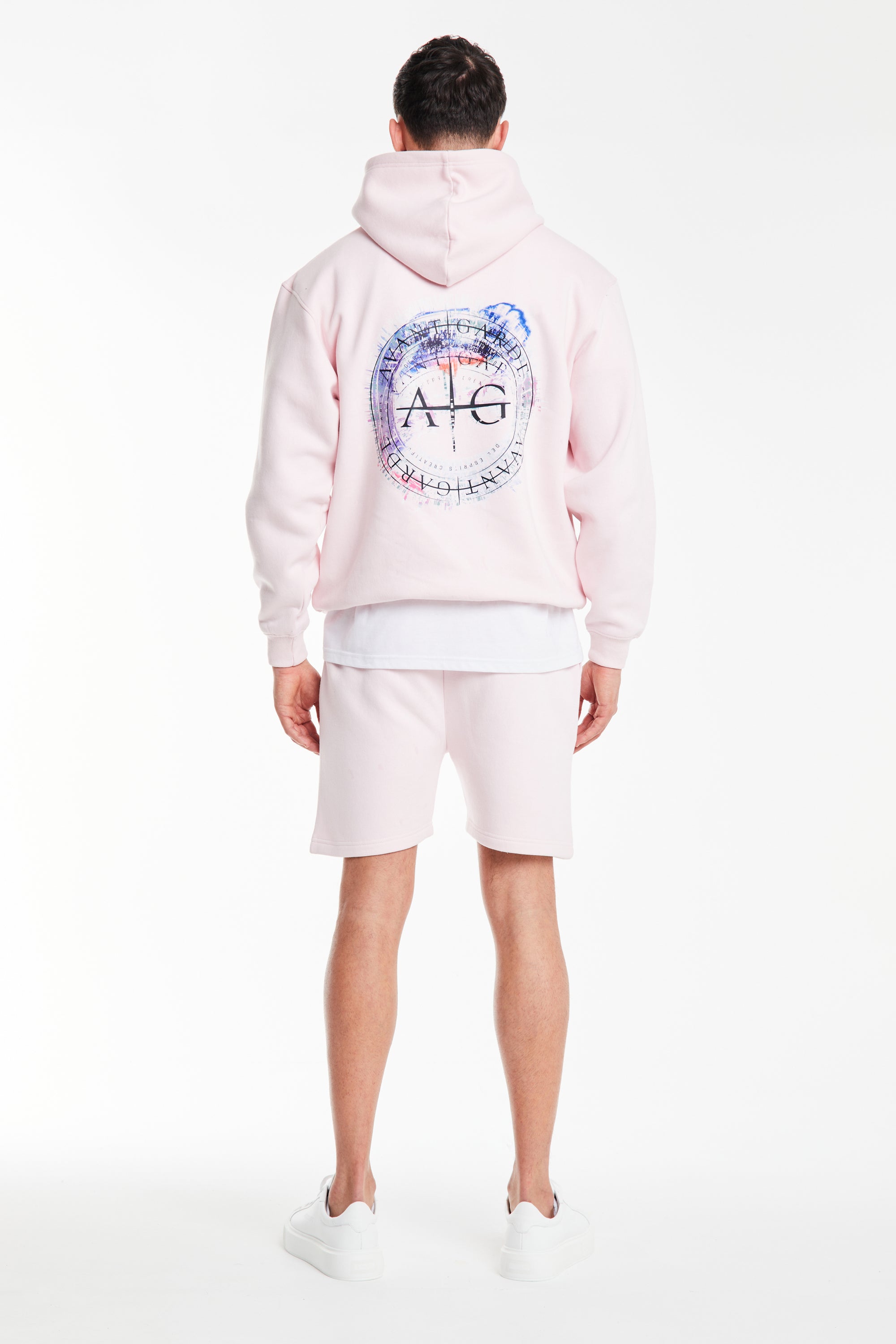back profile of men's twin set in bubblegum pink