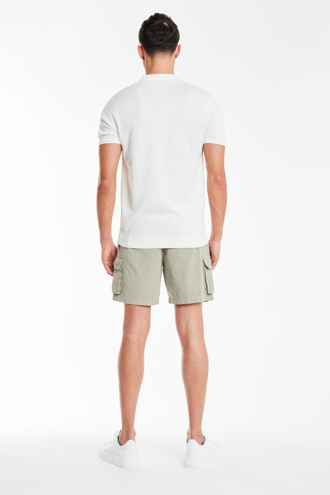 back profile of men's utility shorts with pockets in sage