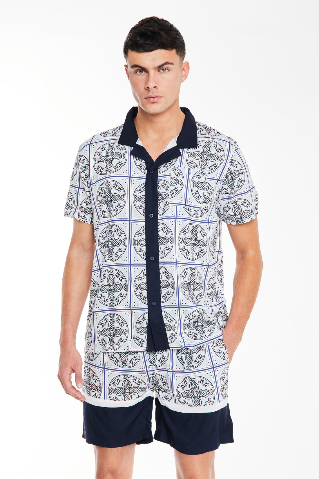 Men's twin set clothing with patterns in white and dark blue