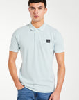 model wearing 'Relate' men's polo shirts sale in sky blue