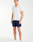 'Williams' men's utility shorts in dark blue styled with shirt