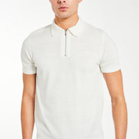 Model styled in a cream 'Harrison' zip knitted polo