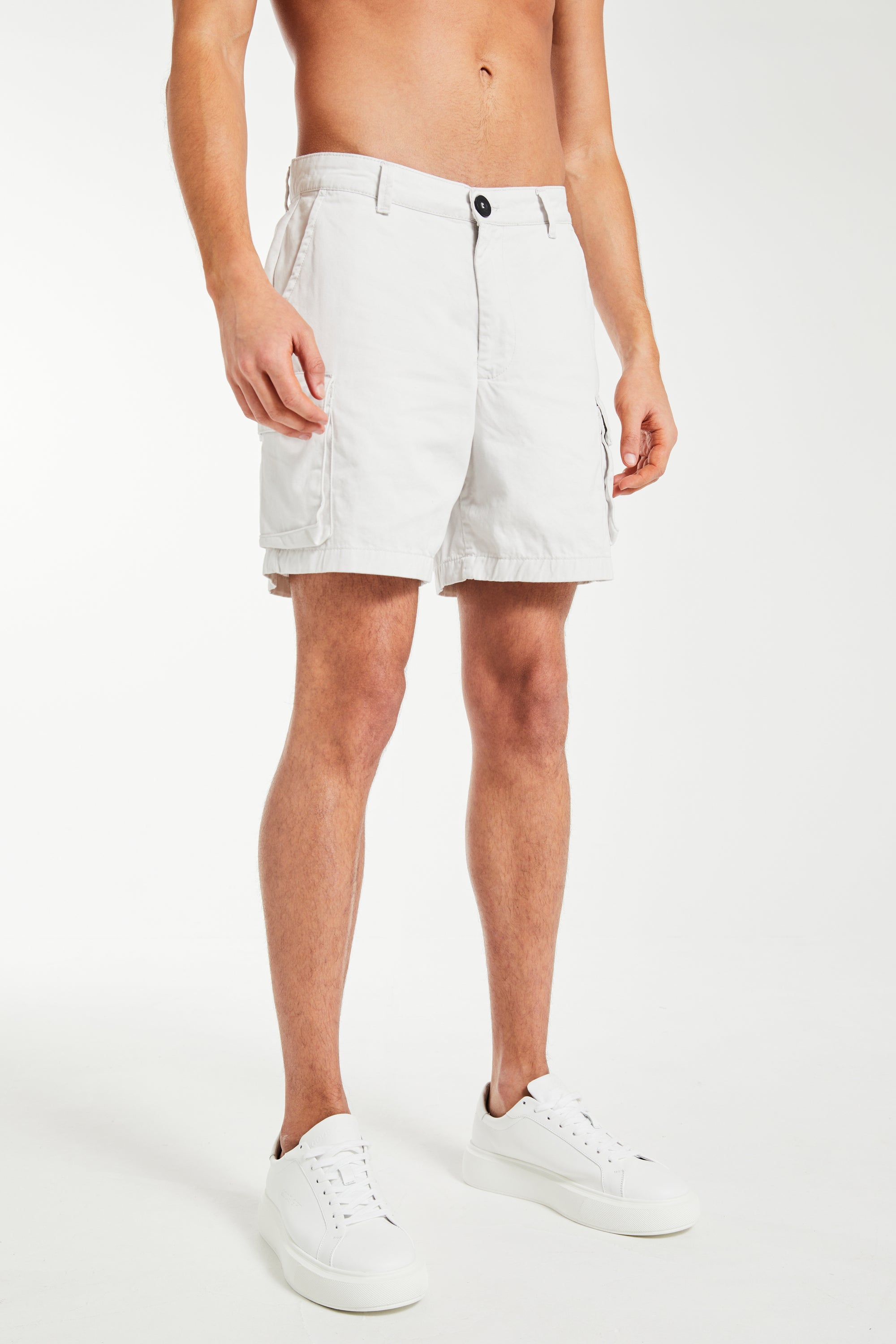 model wearing white men&#39;s utility shorts