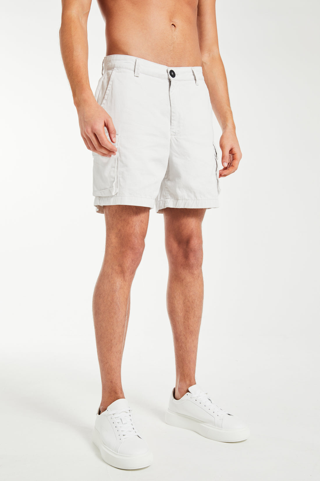 model wearing white men's utility shorts