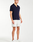 model wearing navy short sleeve shirt for men