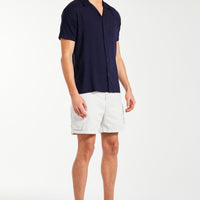 model wearing navy short sleeve shirt for men