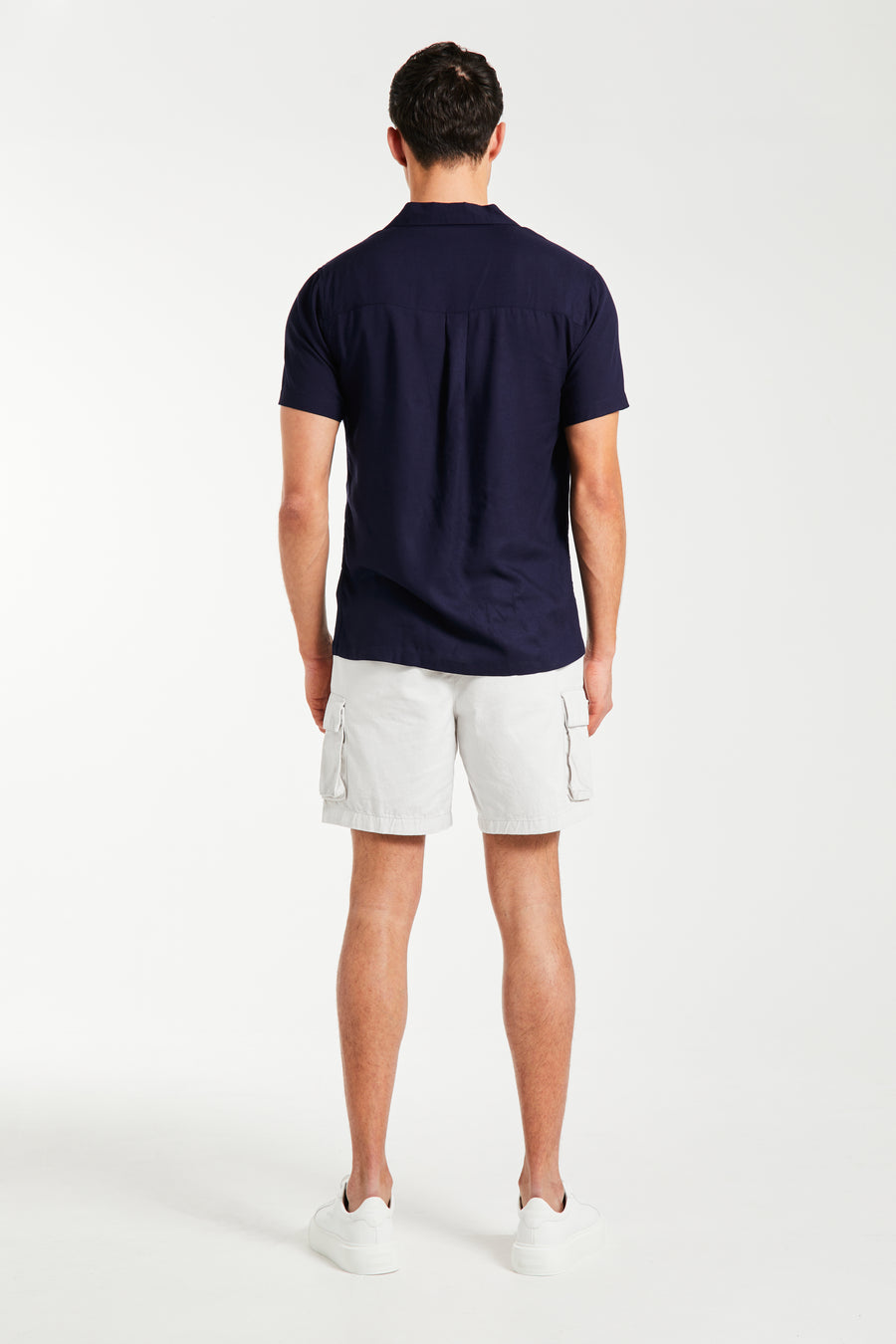 back profile of men's summer shirt in blue
