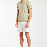 men's knitwear polo in beige styled with shorts