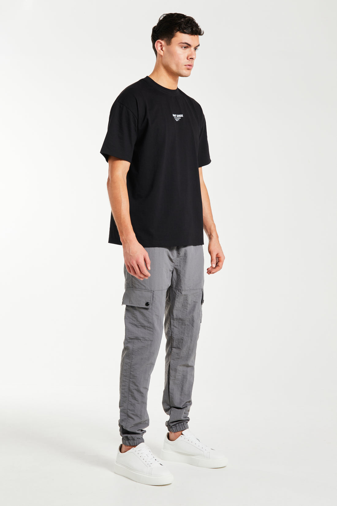 side profile of men's cargo pants sale in dark grey