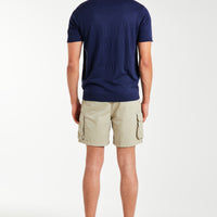 back profile of model wearing men's utility shorts and polo