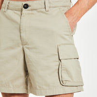 close up of men's utility shorts in light beige