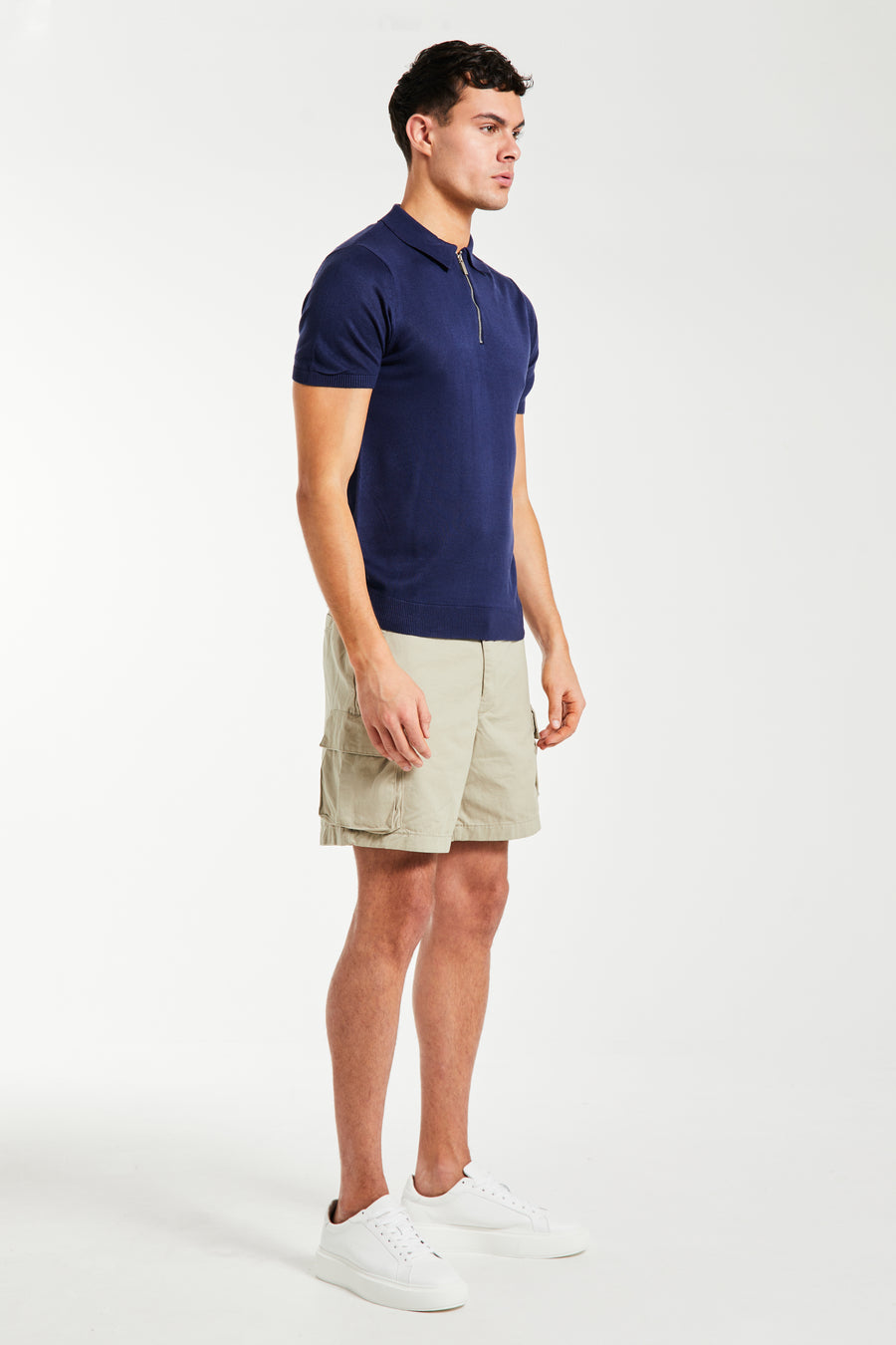 side profile of navy men's knitted polo 