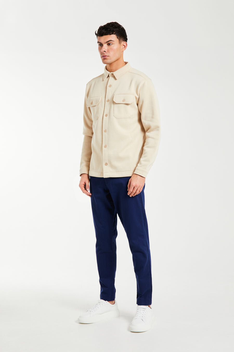 model wearing full outfit with men's chinos sale in royal blue