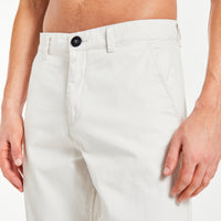 Close up of cheap men's chinos with black button