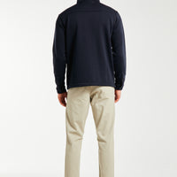 back profile of cheap men's chino pants in beige