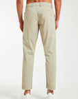 back profile of cheap men's chinos in beige