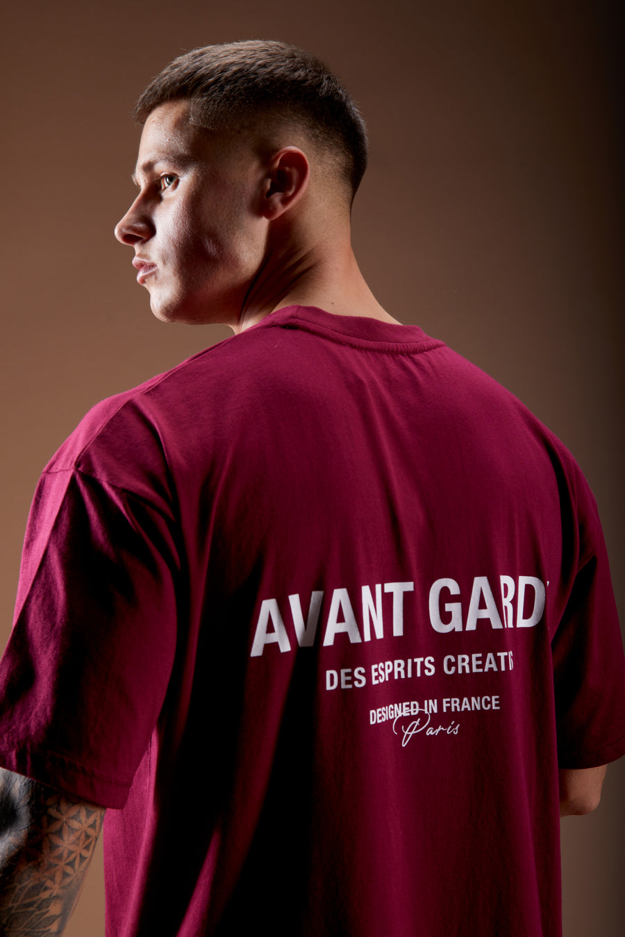 Brand detail of Avant Garde tee (burgundy)