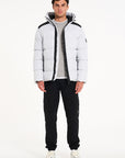 Alps Puffer Jacket and black cargo pants