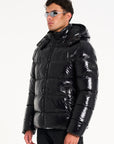 Model wearing black winter bubble coat