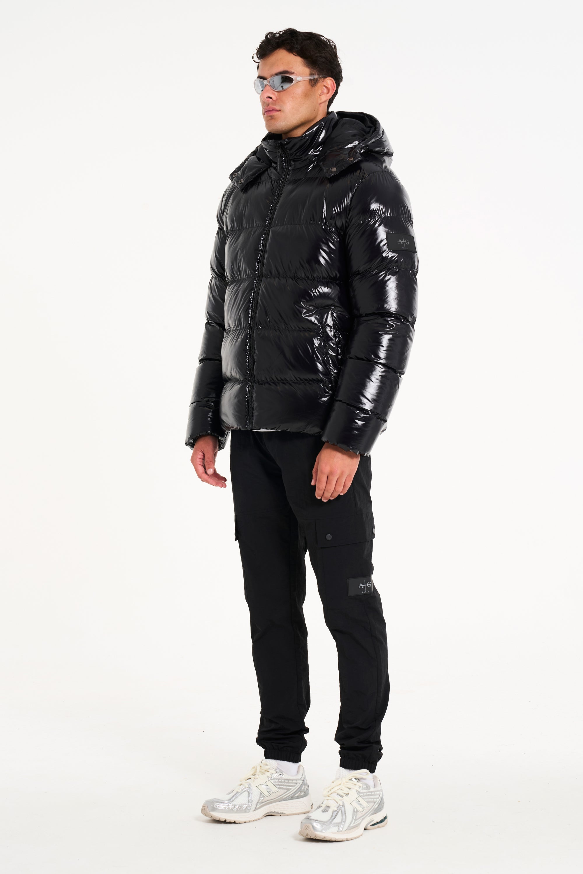 hooded puffer jacket zipped up (full model image)