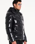 hooded puffer jacket in black (side profile)