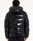 Back of hooded puffer jacket in black from Avant Garde