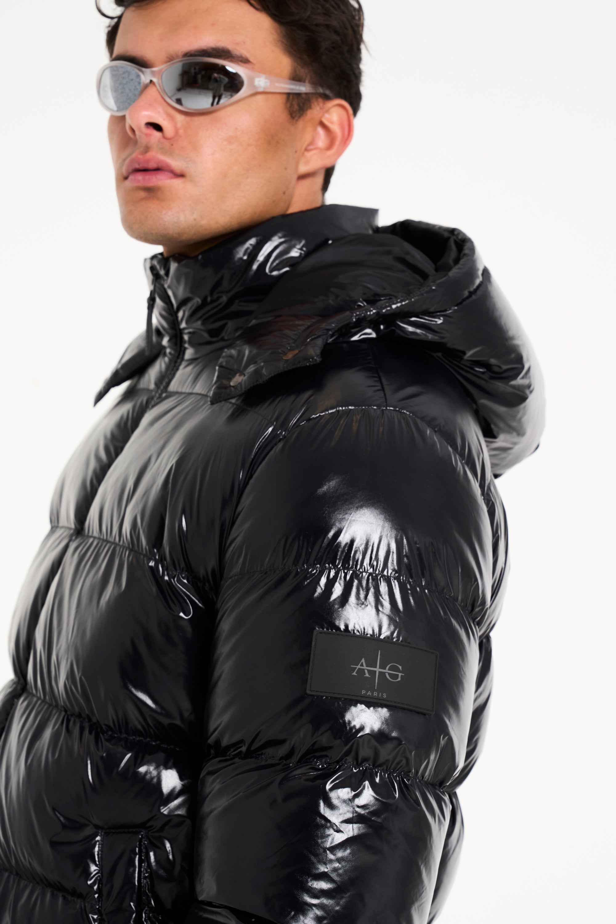 Logo detail on black puffer jacket