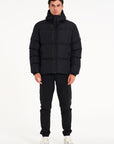 Mens black puffer jacket and cargo trousers