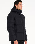 Male model wearing black puffer jacket