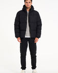 Front view of mens puffer jacket in black