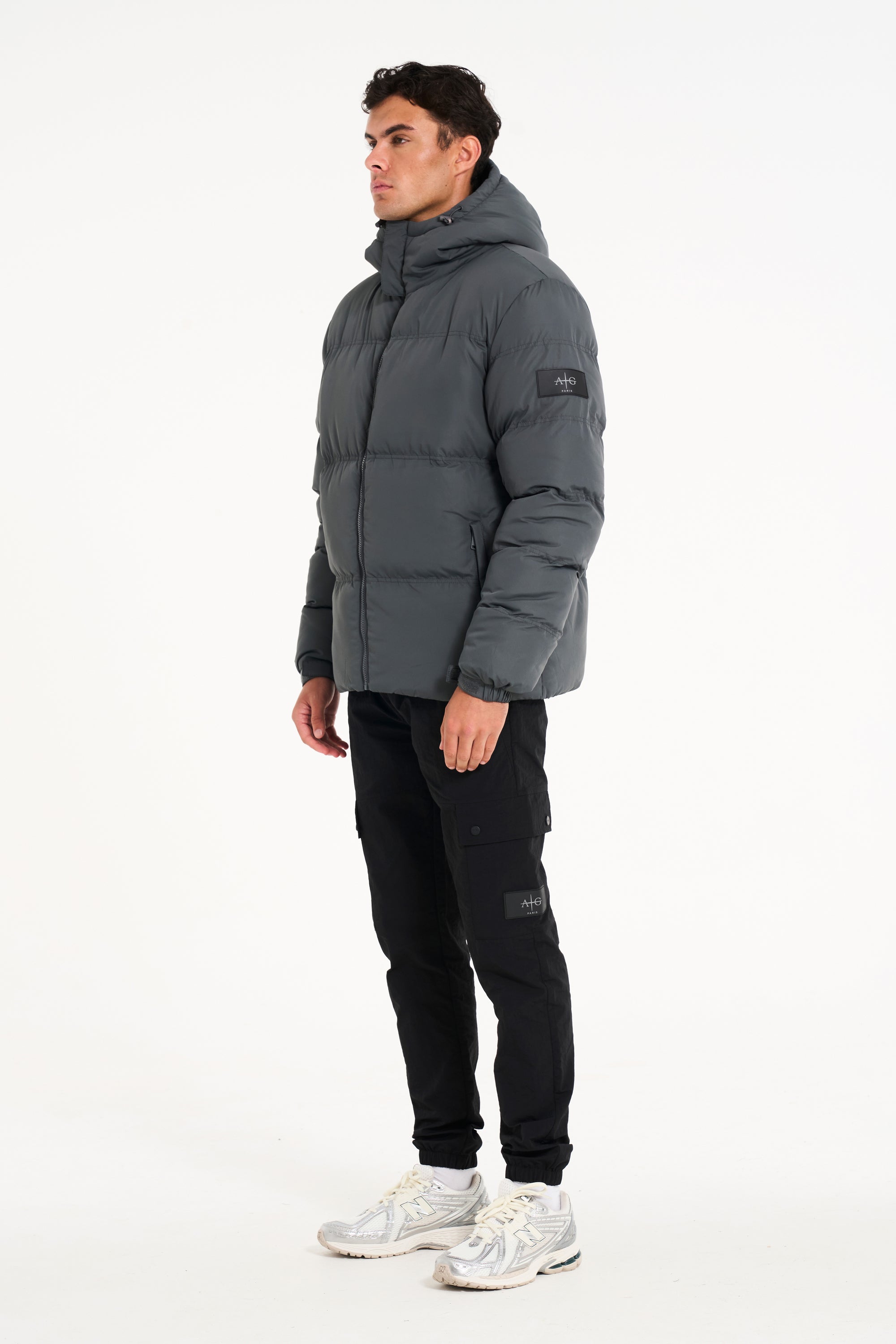 Side of mens puffer jacket (full model view)