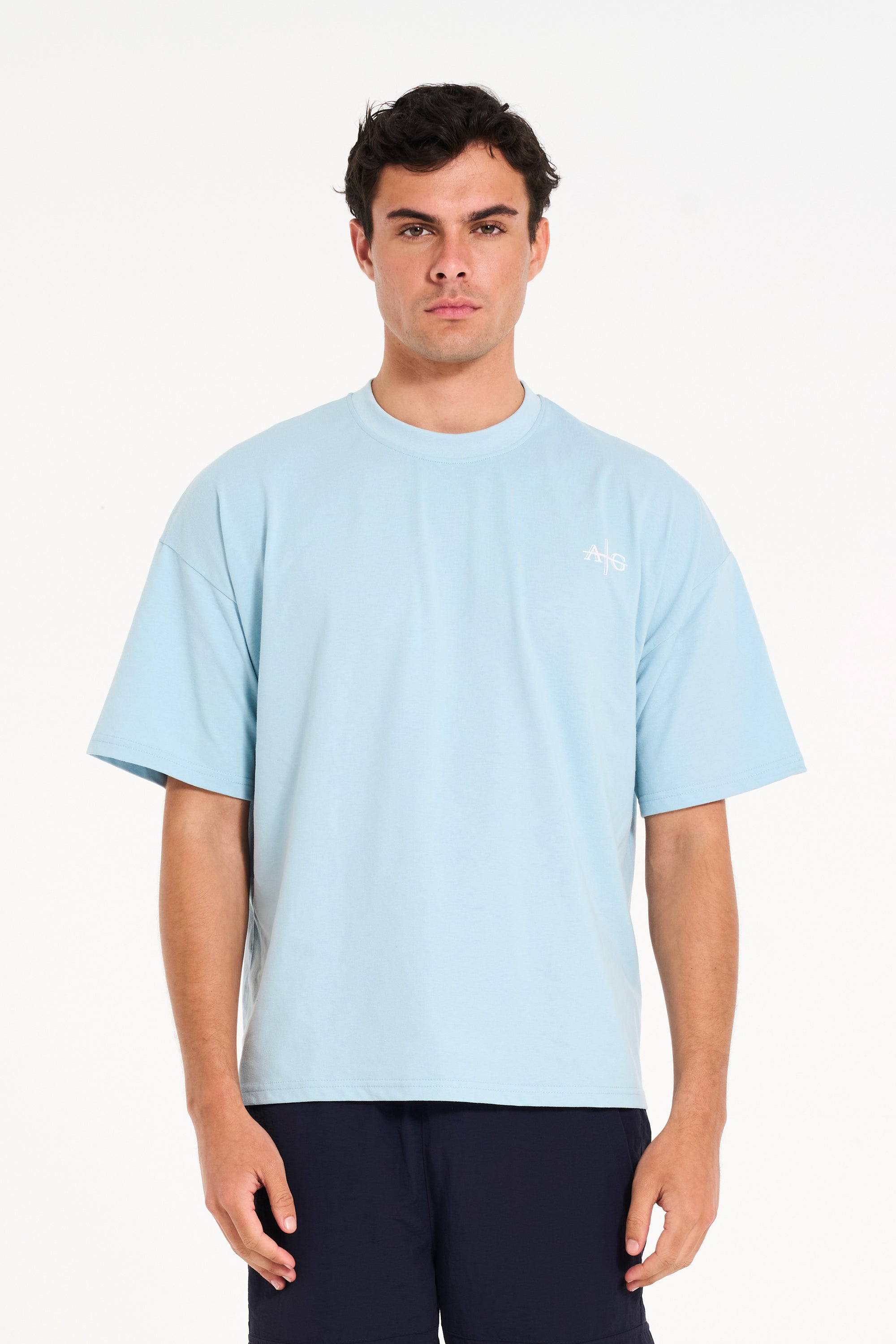 Front shot of man wearing crew neck T-shirt in sky blue