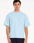 Front shot of man wearing crew neck T-shirt in sky blue